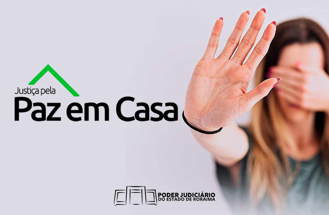 Mulher cobrindo os olhos com uma mão e fazendo sinal de "pare " com a outra. Na foto, está escrito "Paz em Casa".